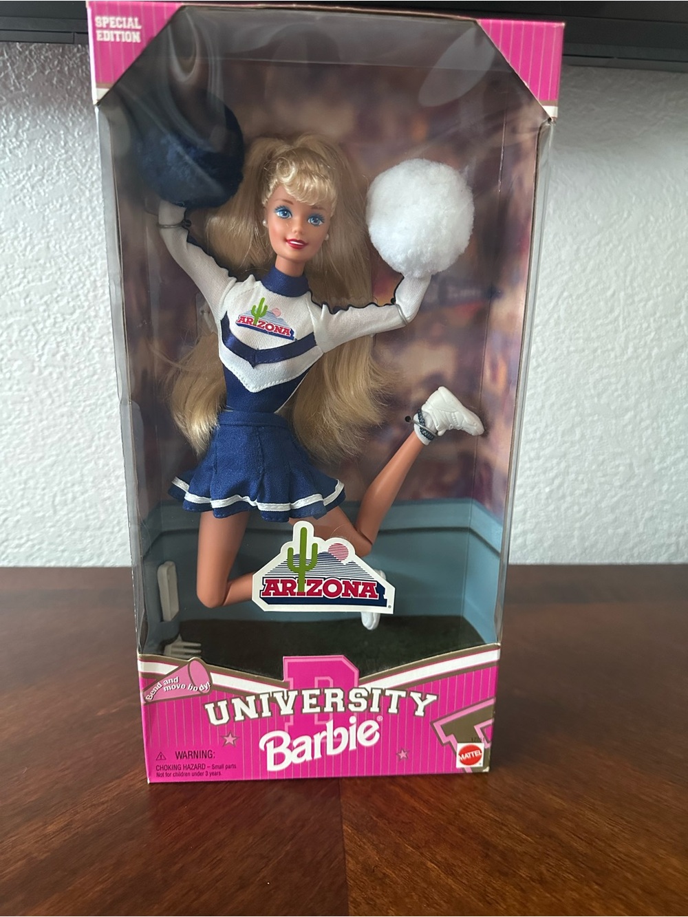 Barbie university of Arizona Cheerleader in Navy, White & Pink Box. Never opened